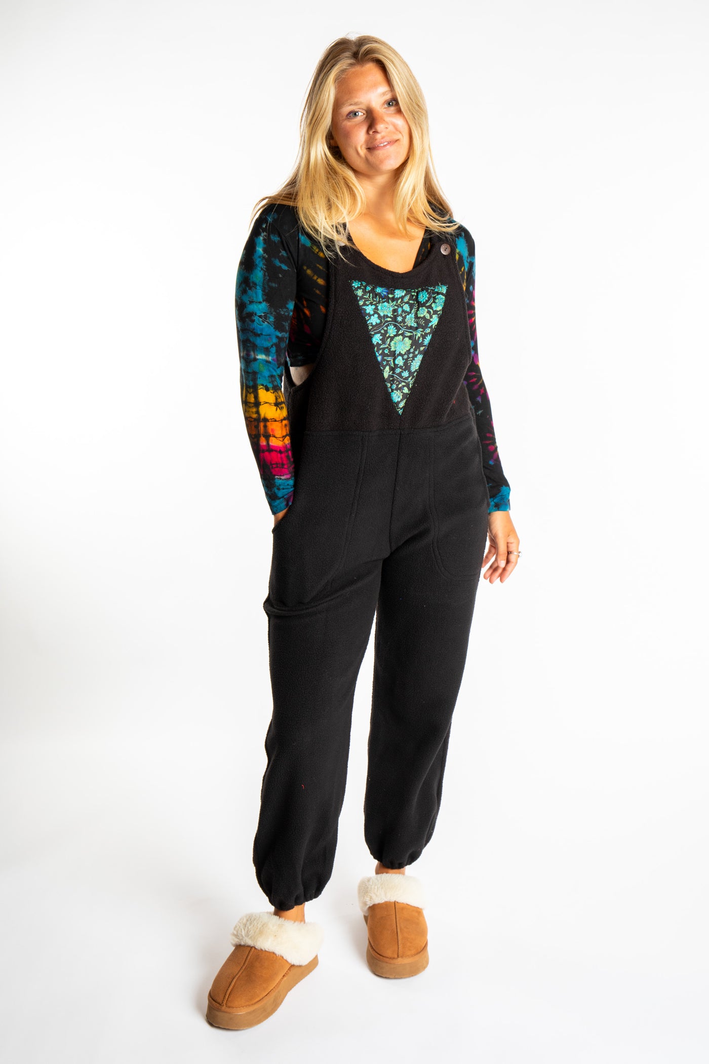 Sophie is wearing the S/M Black Fleece Overalls