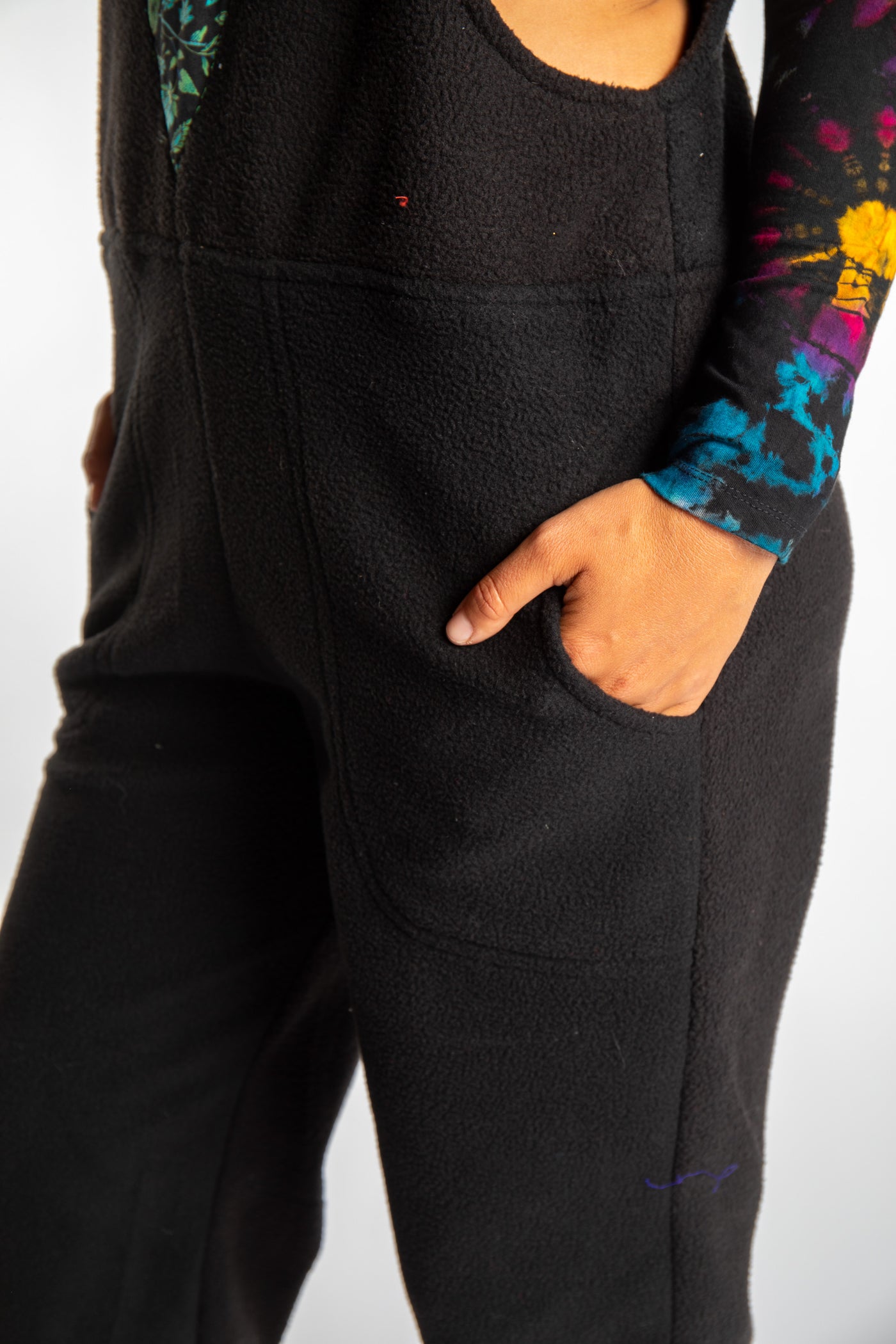 detail of black fleece overalls pocket