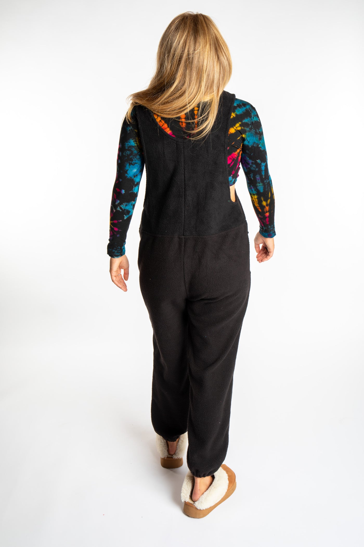 Sophie is wearing the S/M Black Fleece Overalls