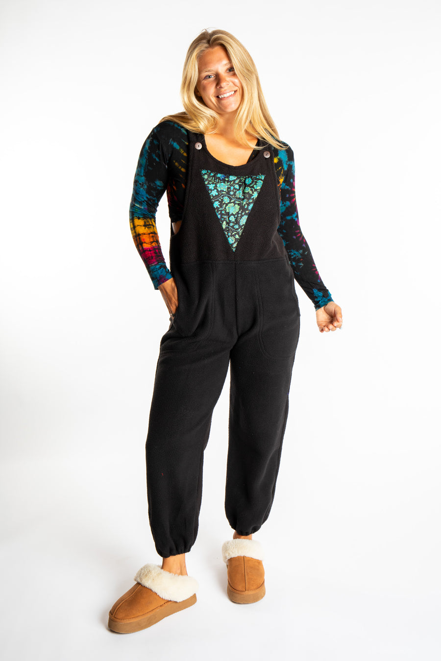 Sophie is wearing the S/M Black Fleece Overalls