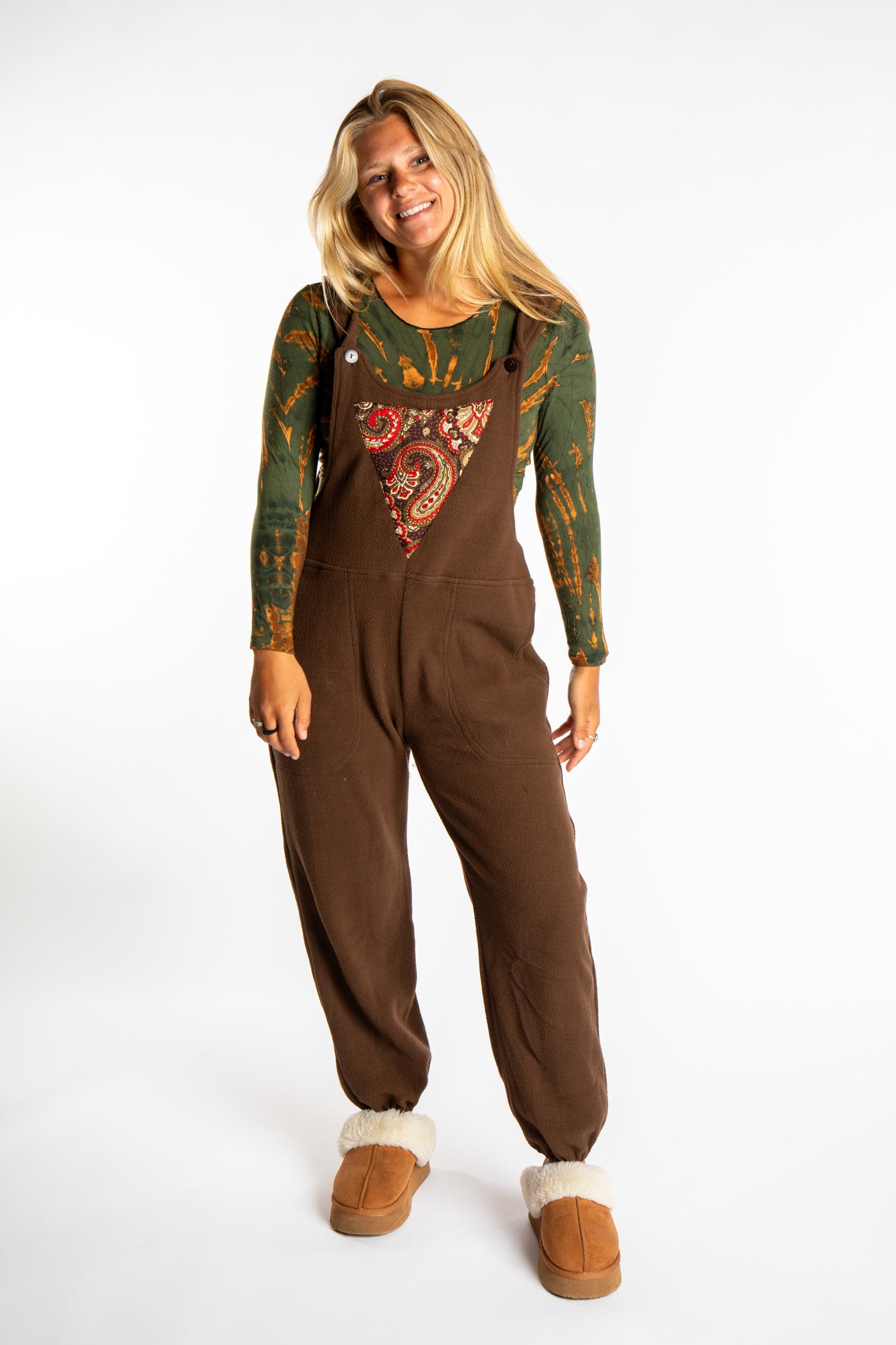 Sophie is wearing the S/M Brown Fleece Overalls