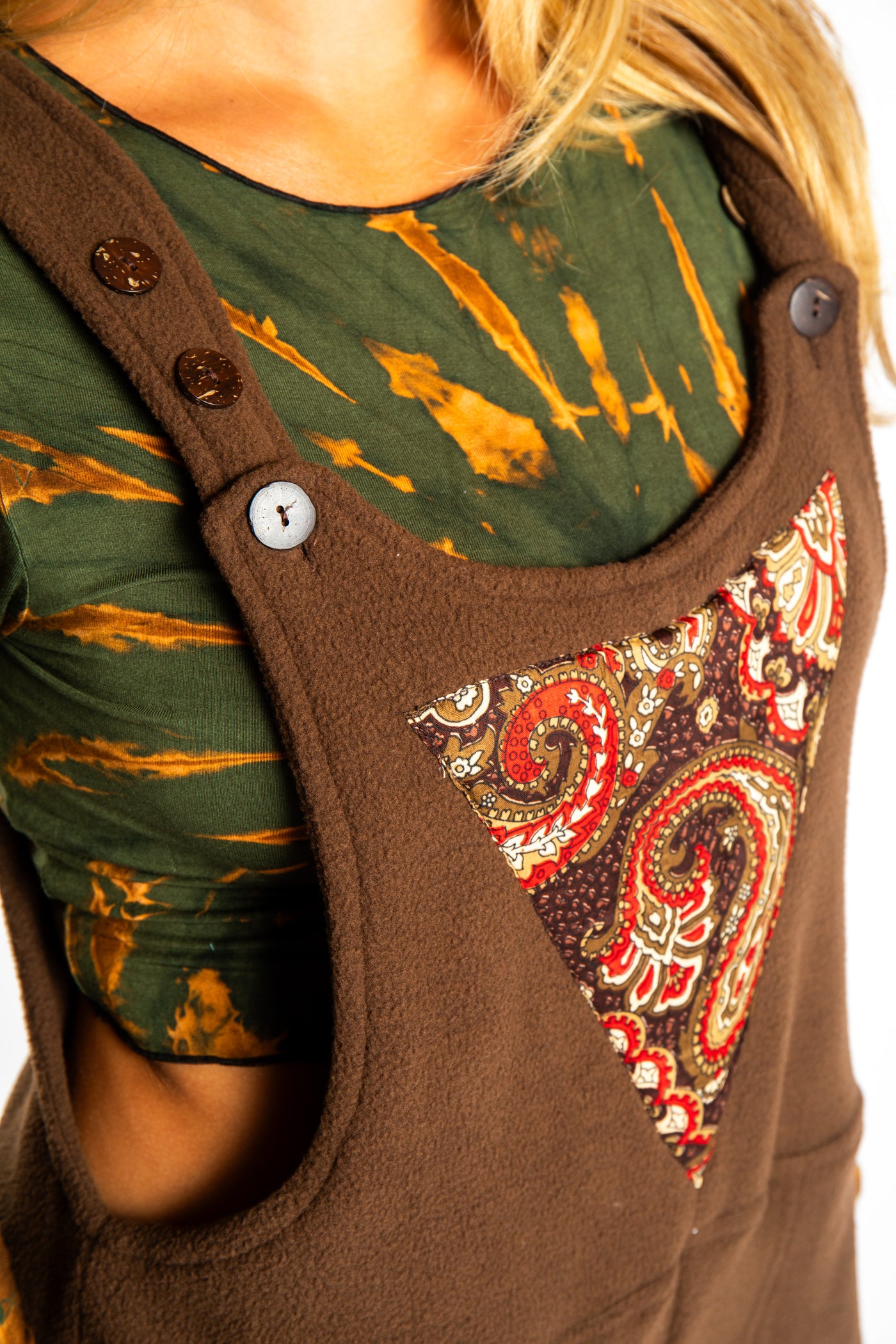 Sophie is wearing the S/M Brown Fleece Overalls