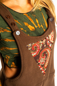 Sophie is wearing the S/M Brown Fleece Overalls