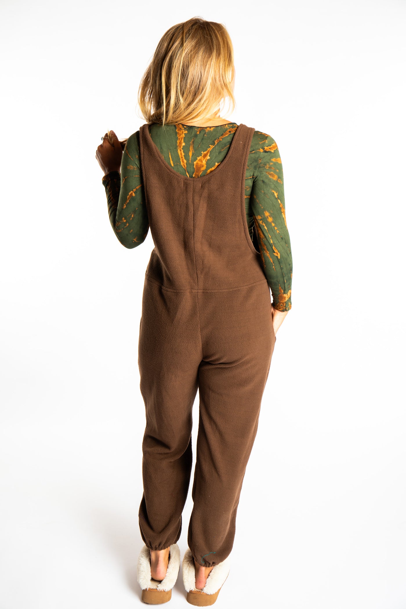Sophie is wearing the S/M Brown Fleece Overalls
