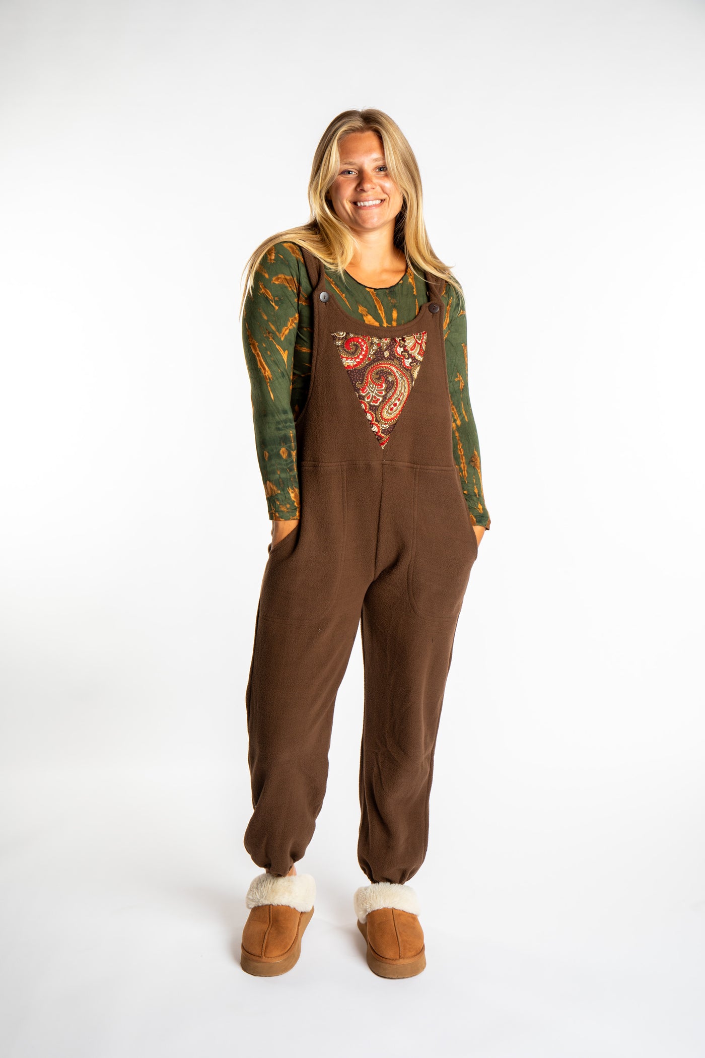 Sophie is wearing the S/M Brown Fleece Overalls
