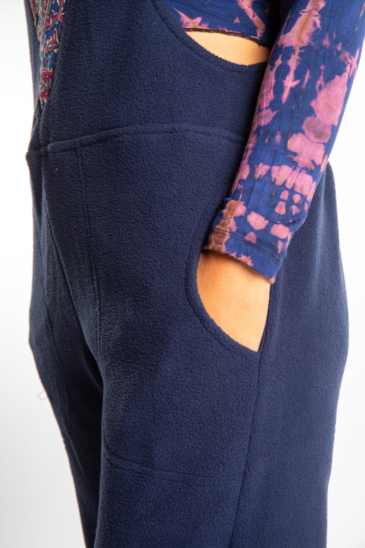 detail of navy fleece overalls pocket