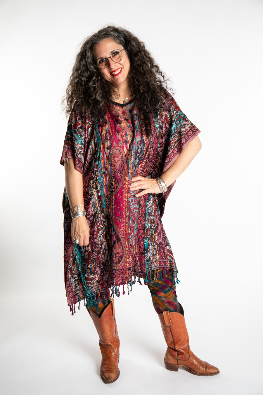Susan is wearing the assorted one size Pari Poncho