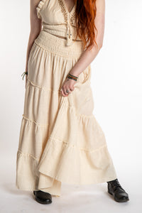 Honora is wearing Flowy Hippie Skirt in Ivory