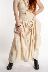 Honora is wearing Flowy Hippie Skirt in Ivory