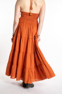 Honora is wearing Flowy Hippie Skirt in Terracotta