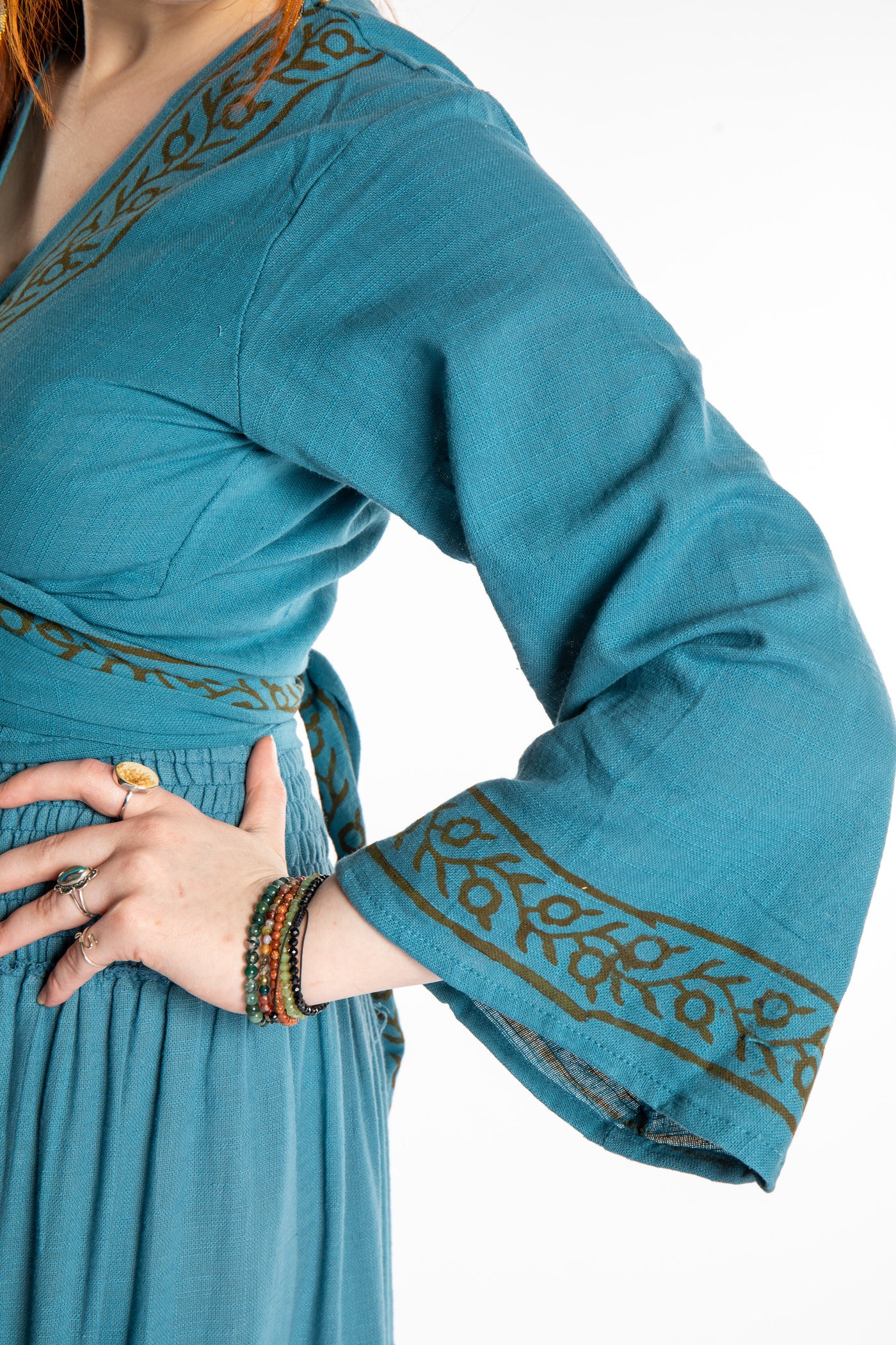 Honora is wearing Bohemian Wrap Top in Sea Blue