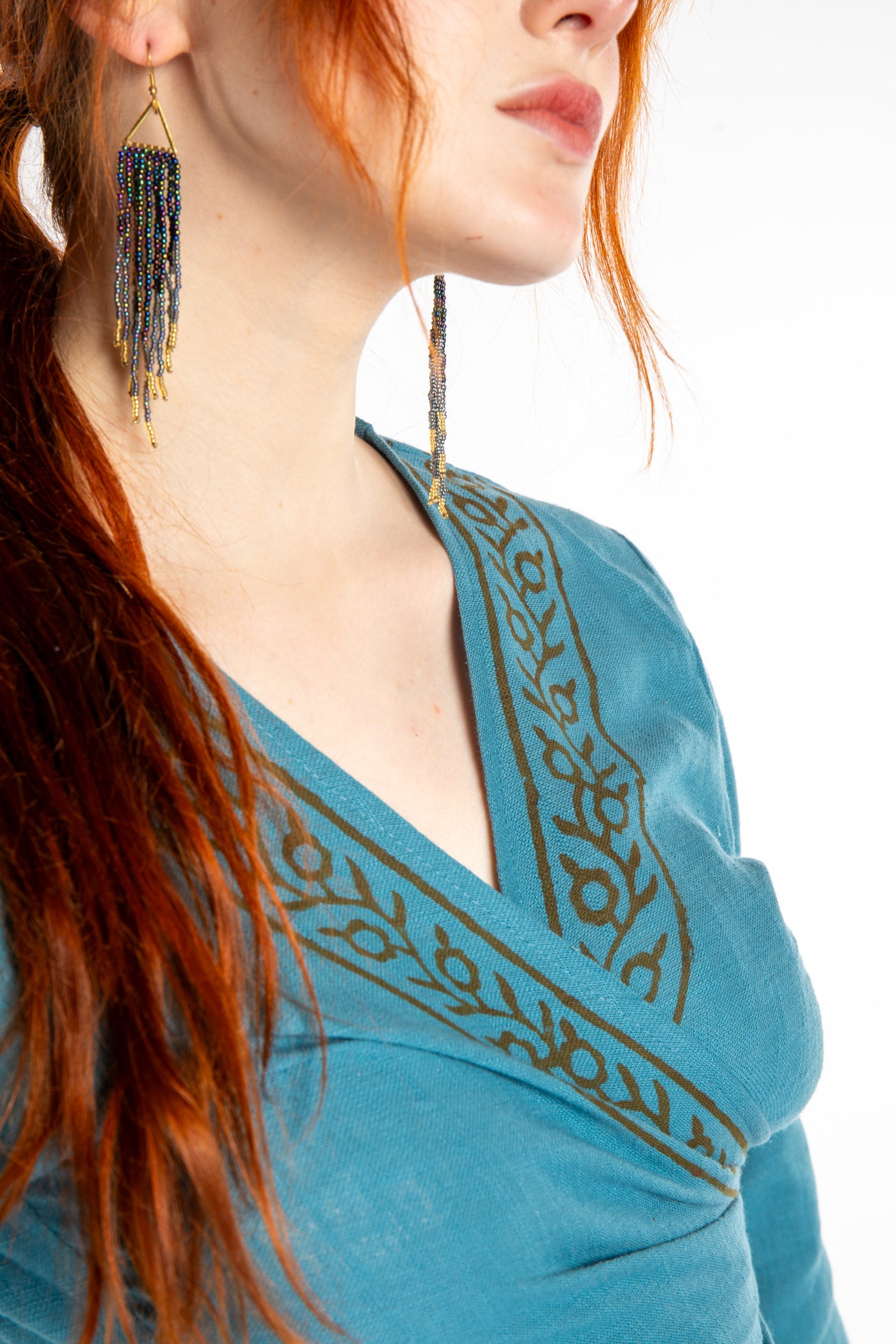 Honora is wearing Bohemian Wrap Top in Sea Blue