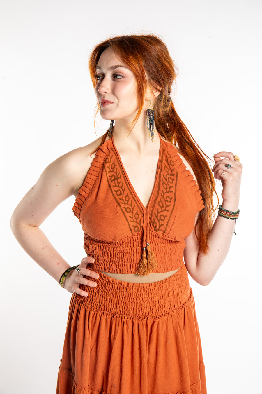 Honora is wearing the Block Print Halter Top in Terracotta
