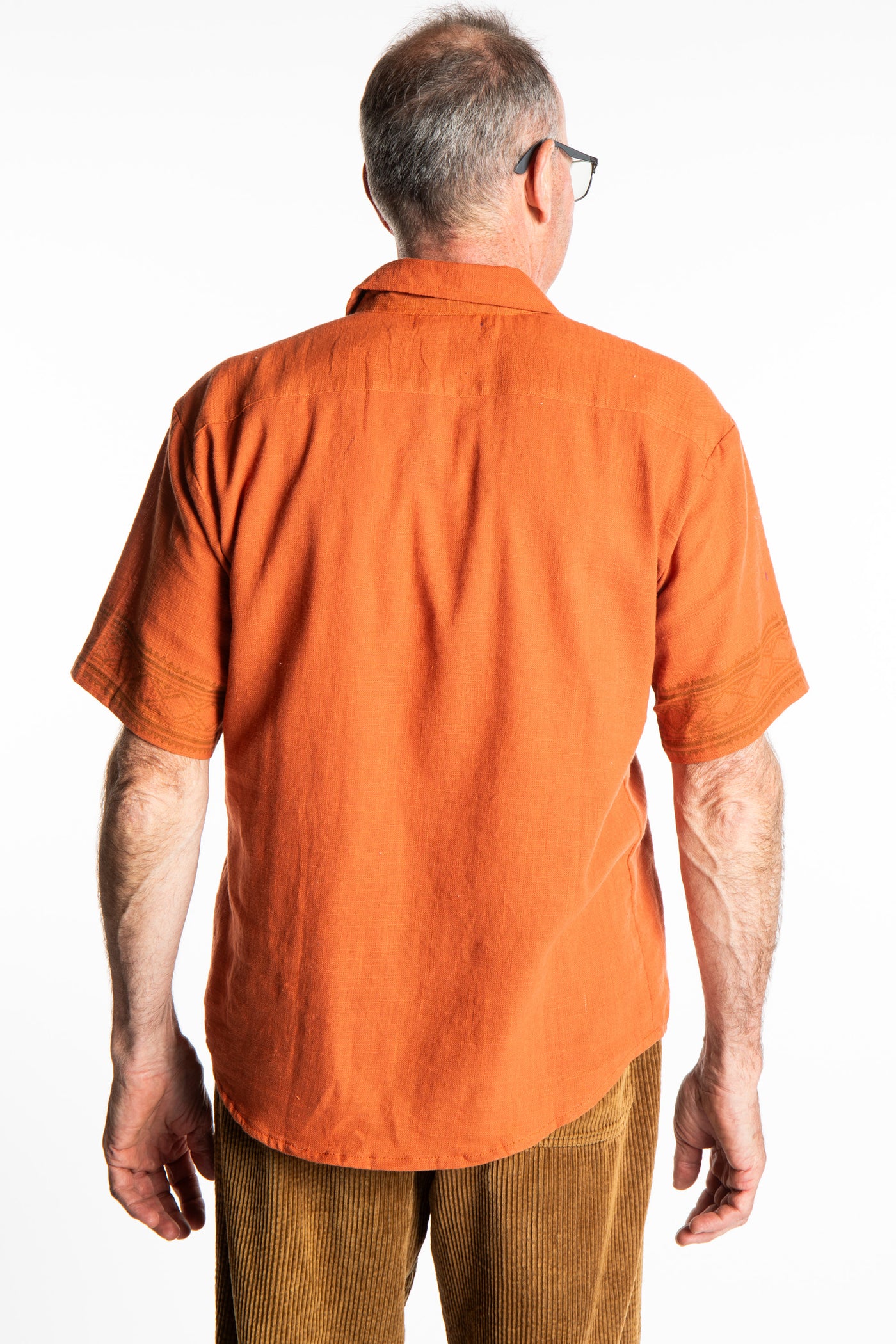 Ross is wearing size M Block Print Cotton Shirt in Terracotta