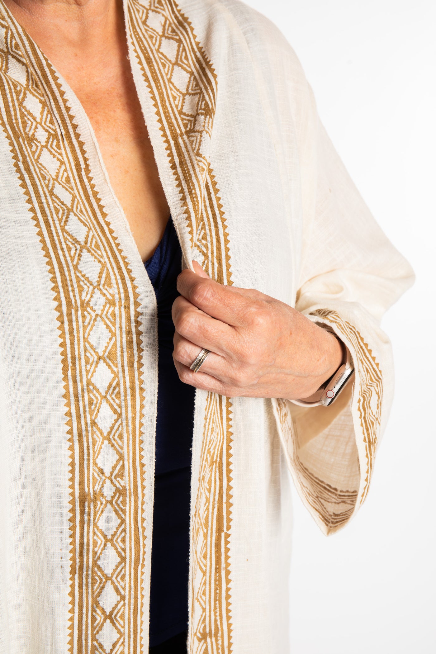 Betty is wearing a Boho Kimono Cover Up in Ivory