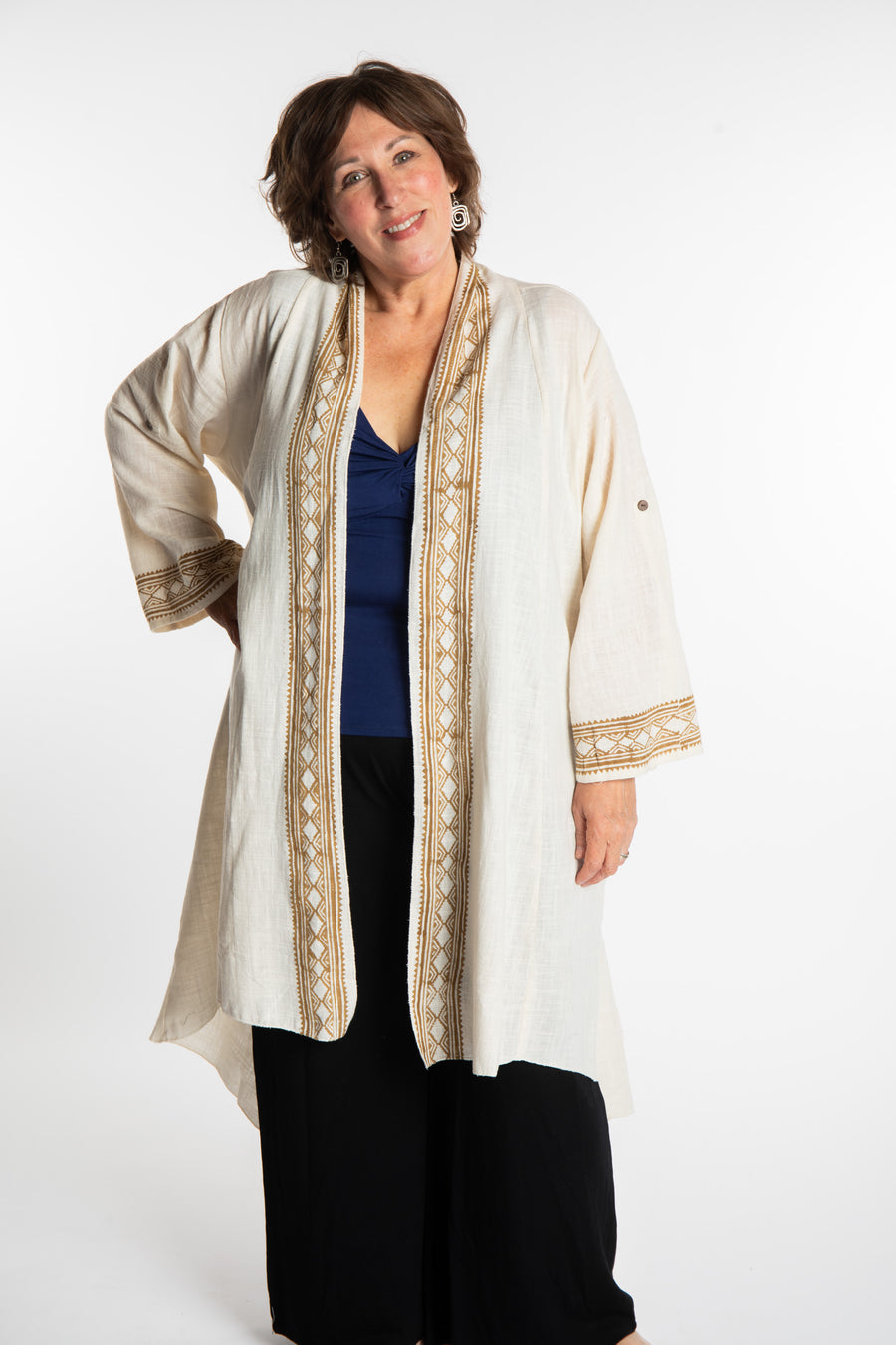 Betty is wearing a Boho Kimono Cover Up in Ivory