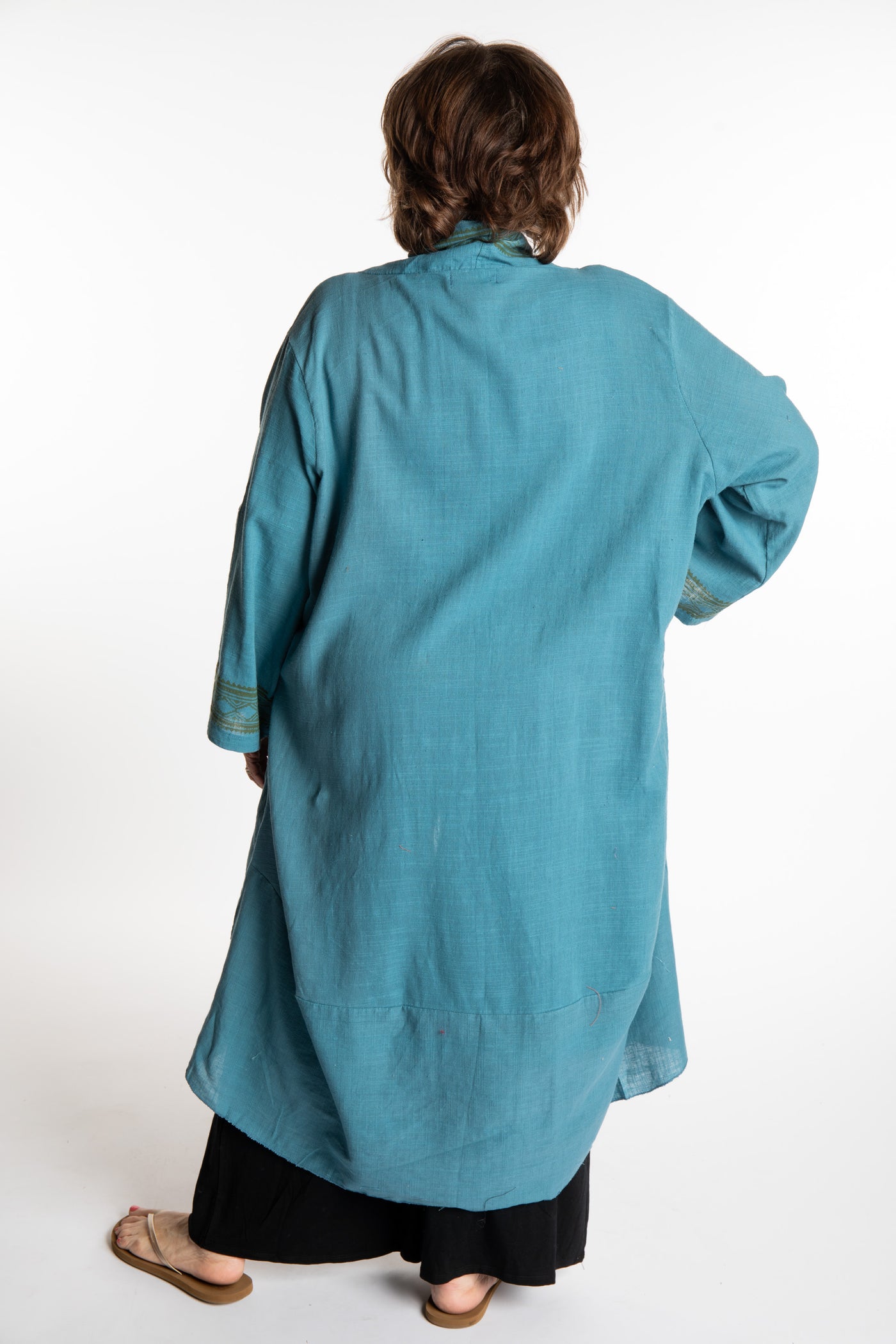 Betty is wearing a Boho Kimono Cover Up in Slate Blue