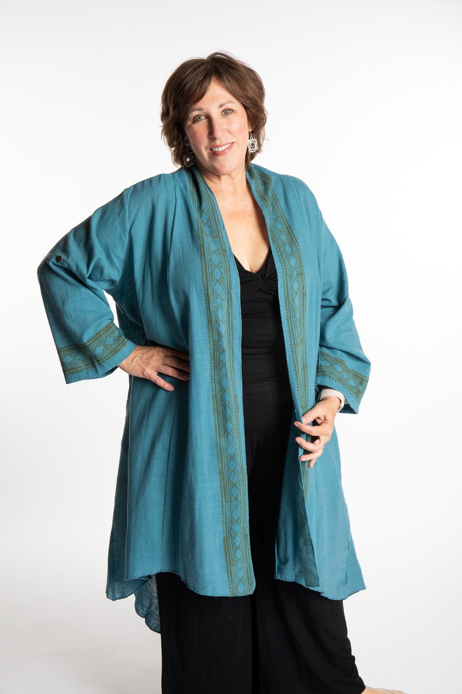 Betty is wearing a Boho Kimono Cover Up in Slate Blue