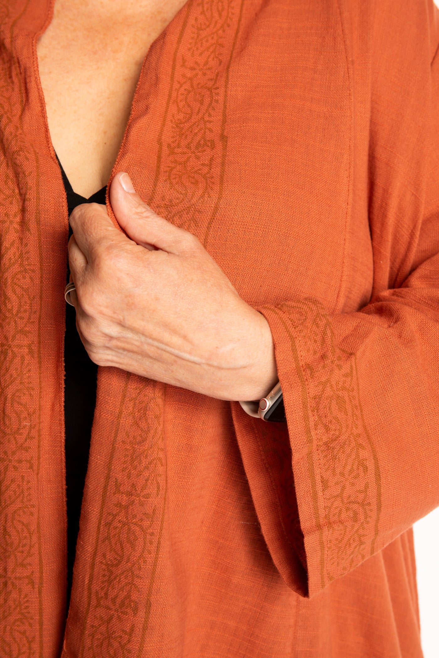 Betty is wearing a Boho Kimono Cover Up in Terracotta