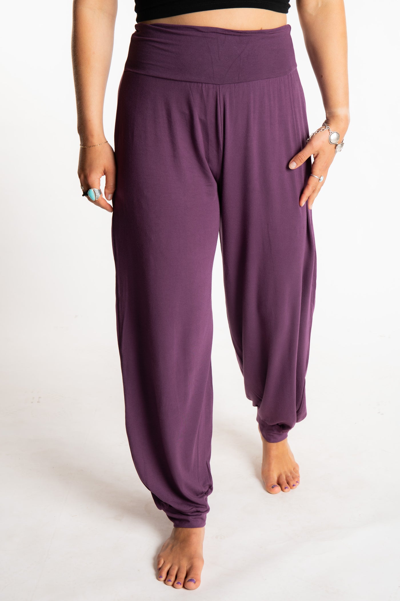 Sophie is wearing size S/M Solid Color Boho Pants in Amethyst