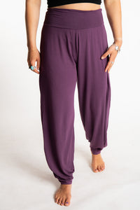 Sophie is wearing size S/M Solid Color Boho Pants in Amethyst