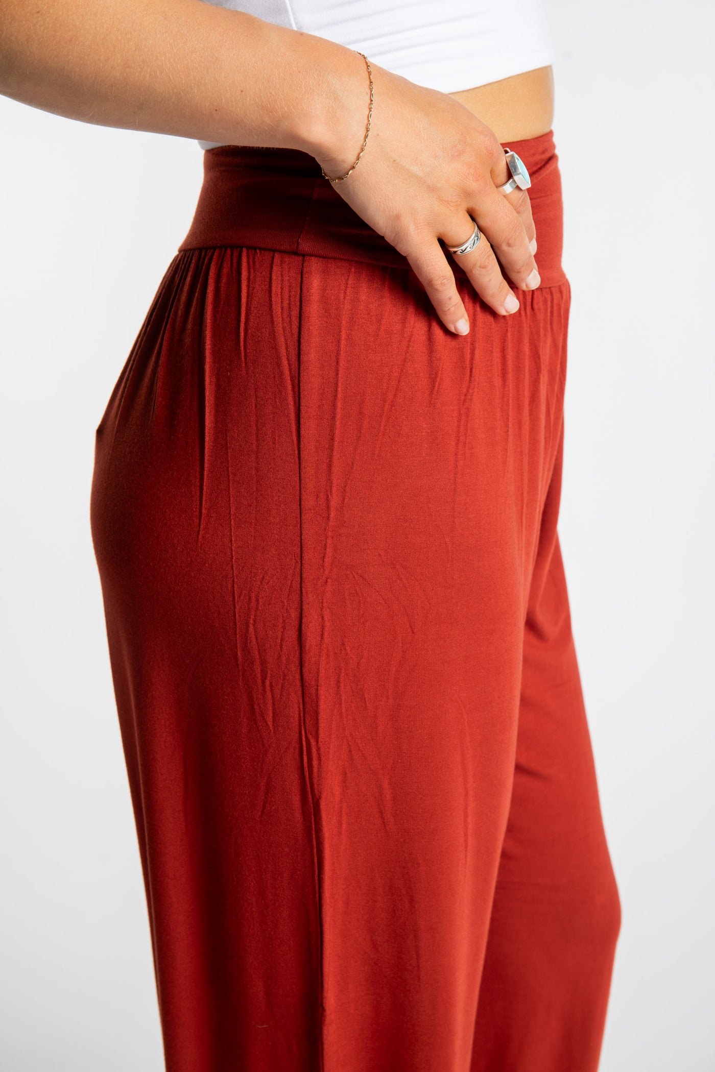 Sophie is wearing size S/M Solid Color Boho Pants in Terracotta