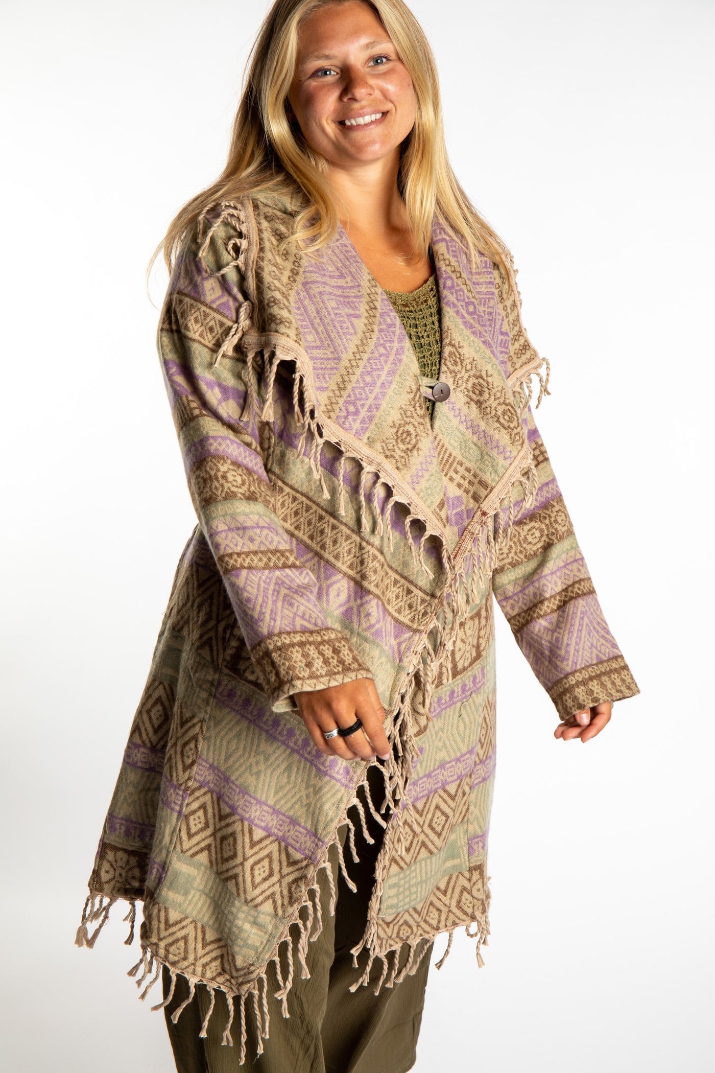 Sophie wearing the Natural tan patterned paisley blanket jacket 
