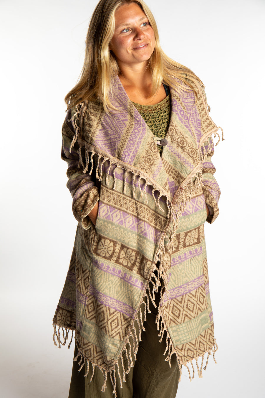 Sophie wearing the Natural tan patterned paisley blanket jacket 