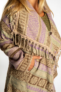 Sophie wearing the Natural tan patterned paisley blanket jacket 