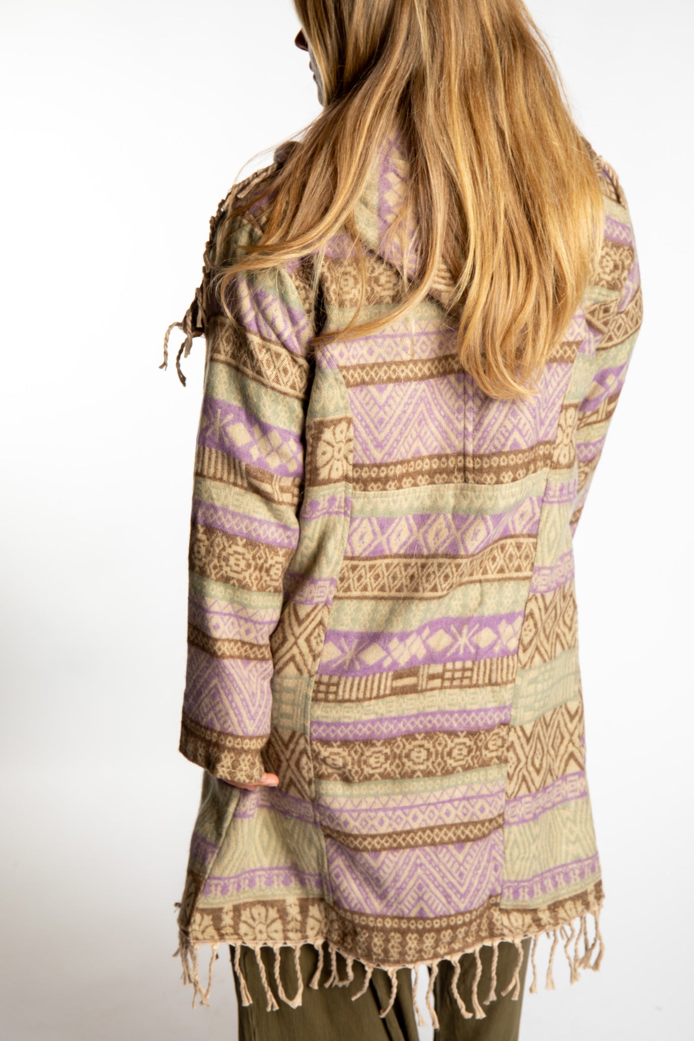 Sophie wearing the Natural tan patterned paisley blanket jacket 