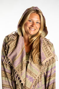Sophie wearing the Natural tan patterned paisley blanket jacket 
