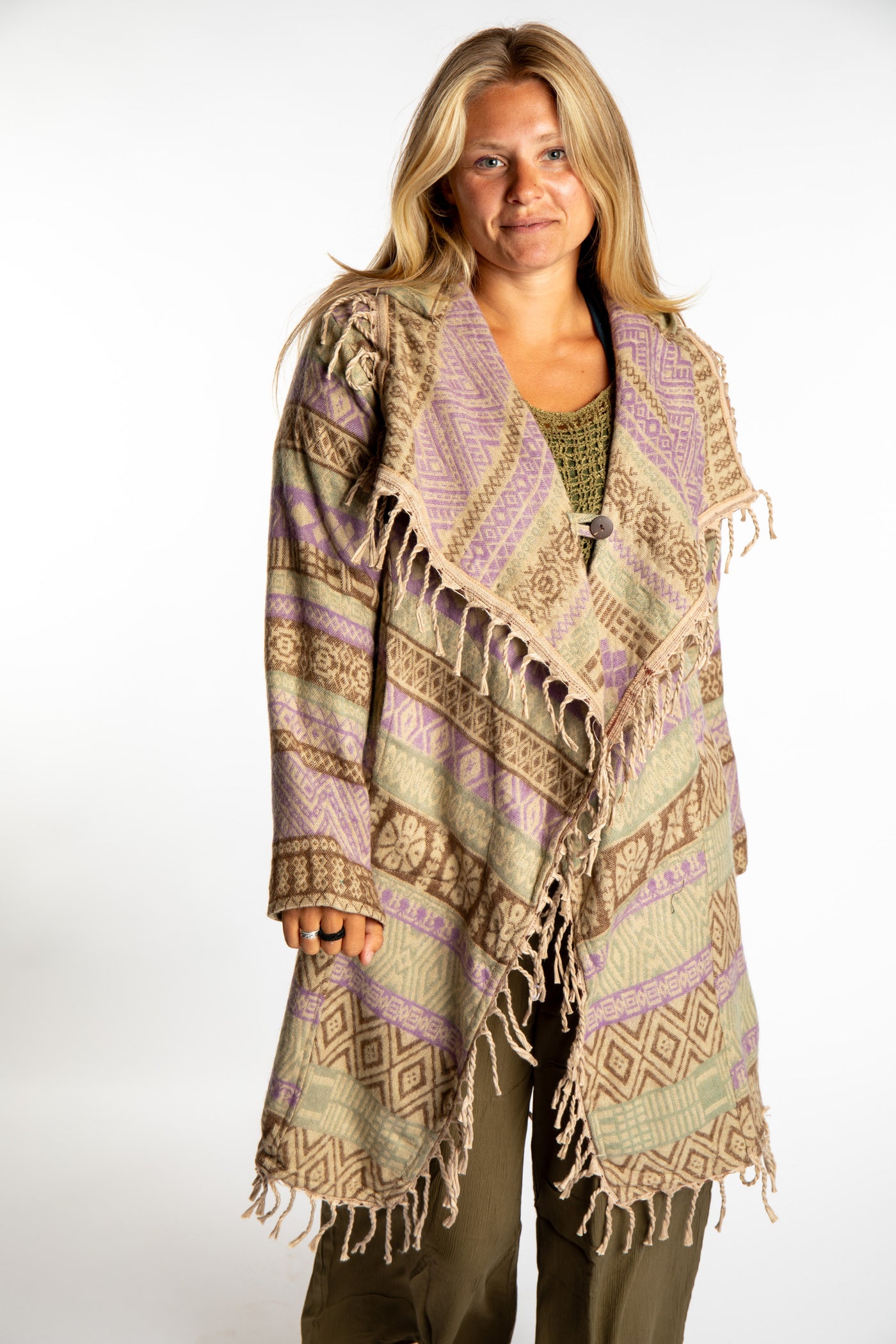 Sophie wearing the Natural tan patterned paisley blanket jacket 