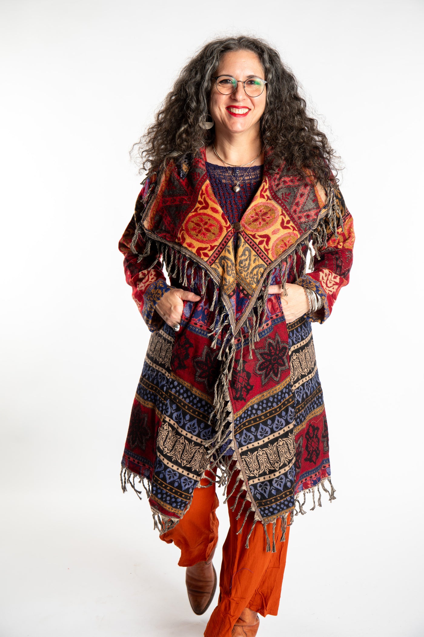 Susan wearing the Orange multicolored patterned blanket jacket 