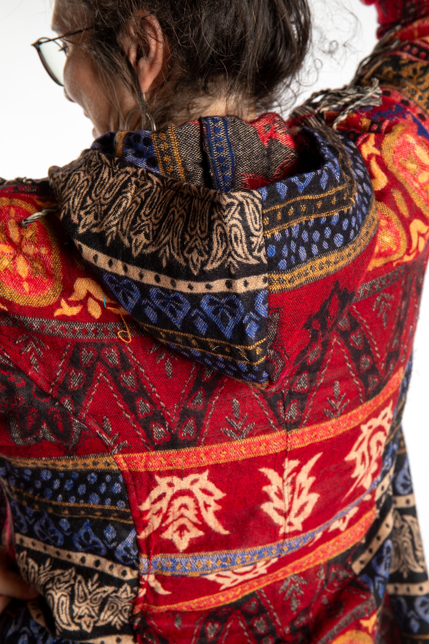 Susan wearing the Orange multicolored patterned blanket jacket 