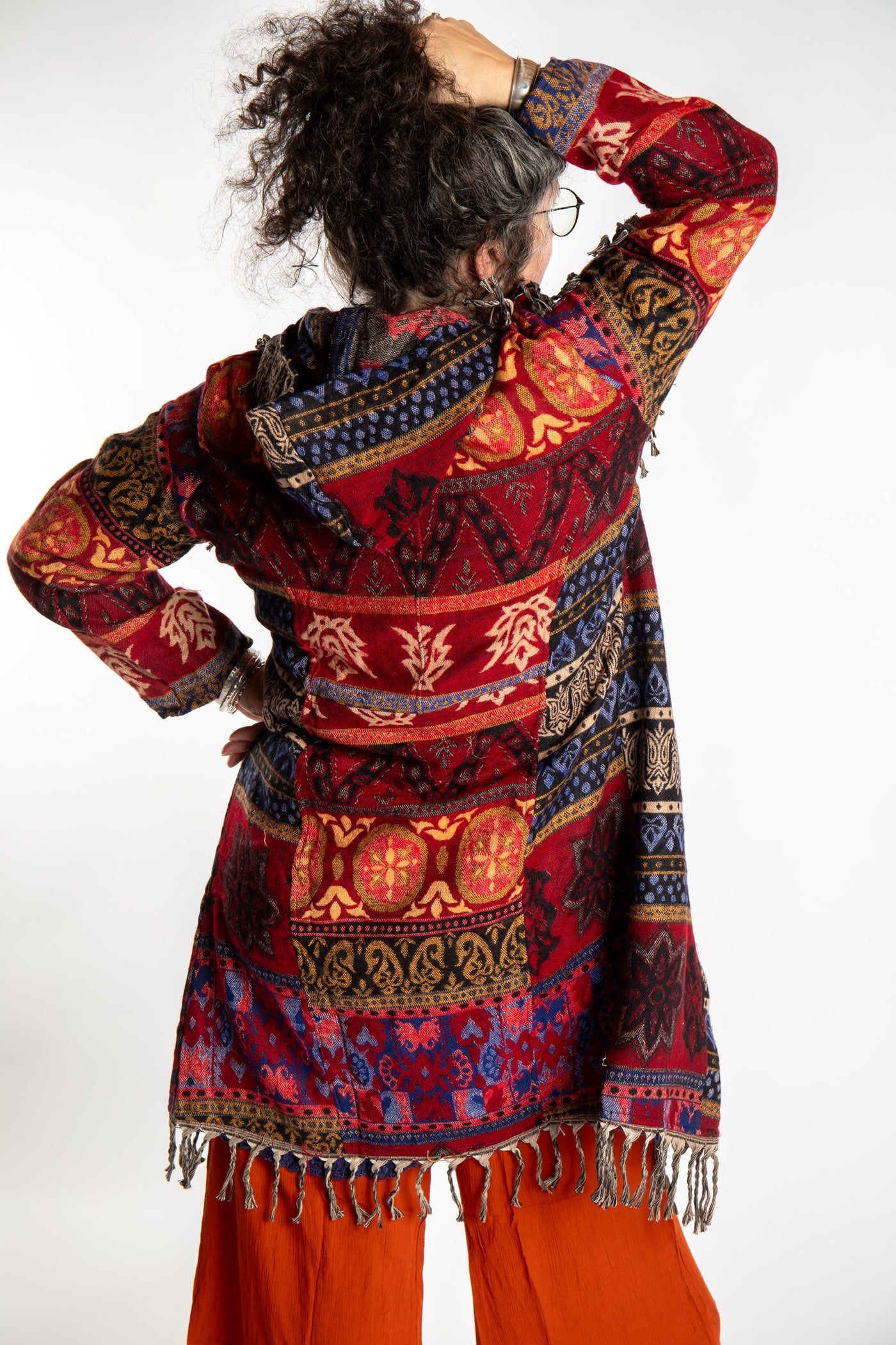 Susan wearing the Orange multicolored patterned blanket jacket 
