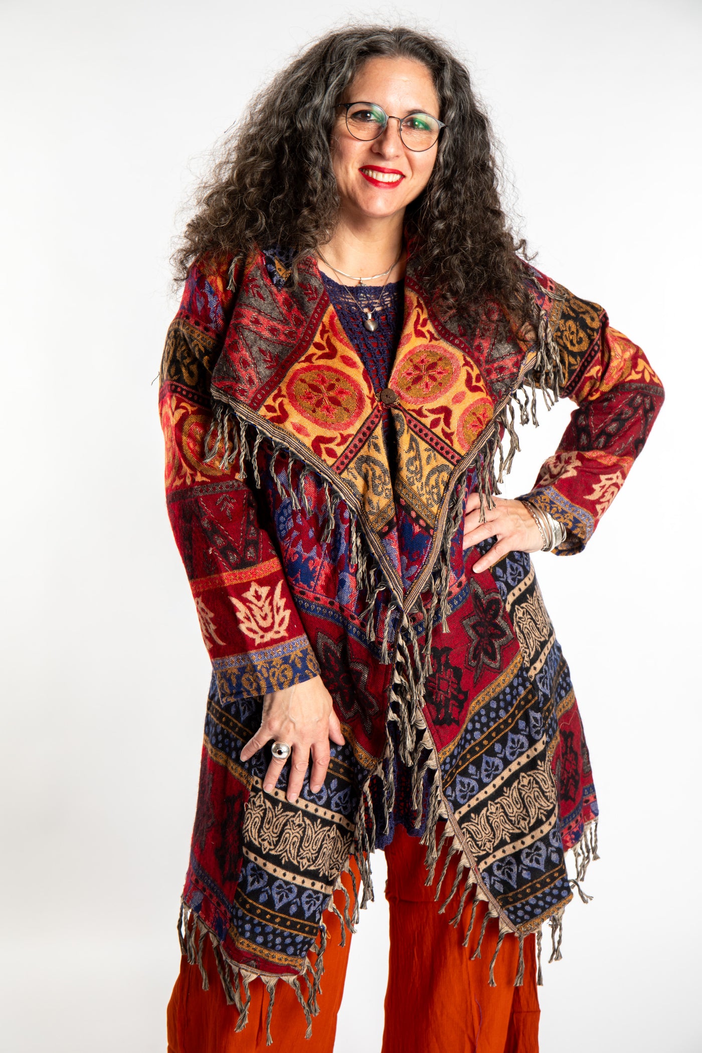 Susan wearing the Orange multicolored patterned blanket jacket 