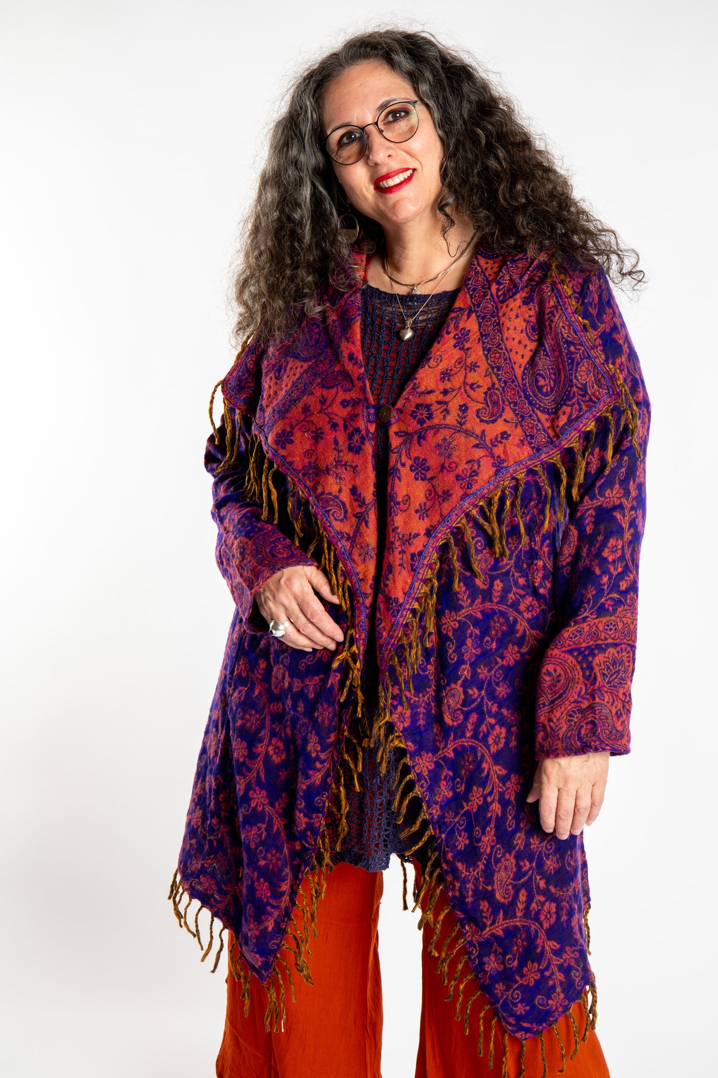 Susan wearing the Purple and orange multicolored paisley patterned blanket jacket 