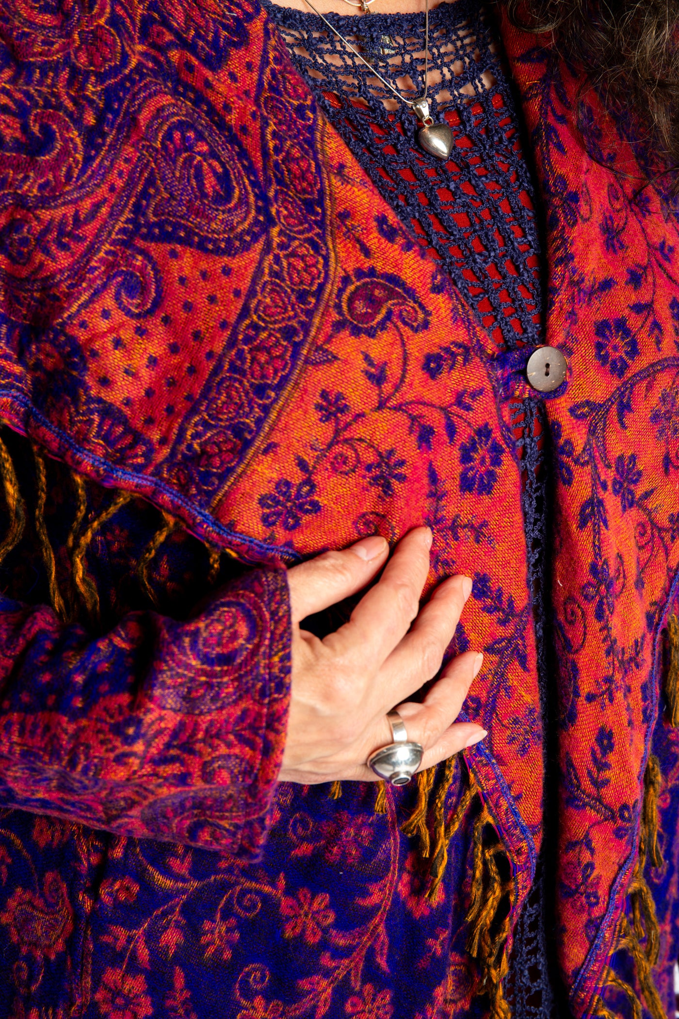 Susan wearing the Purple and orange multicolored paisley patterned blanket jacket 