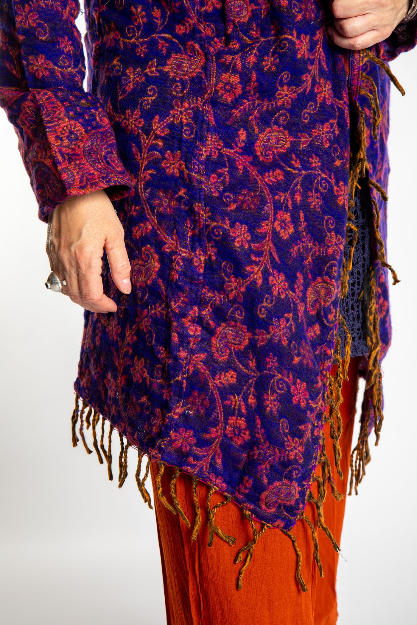 Susan wearing the Purple and orange multicolored paisley patterned blanket jacket 