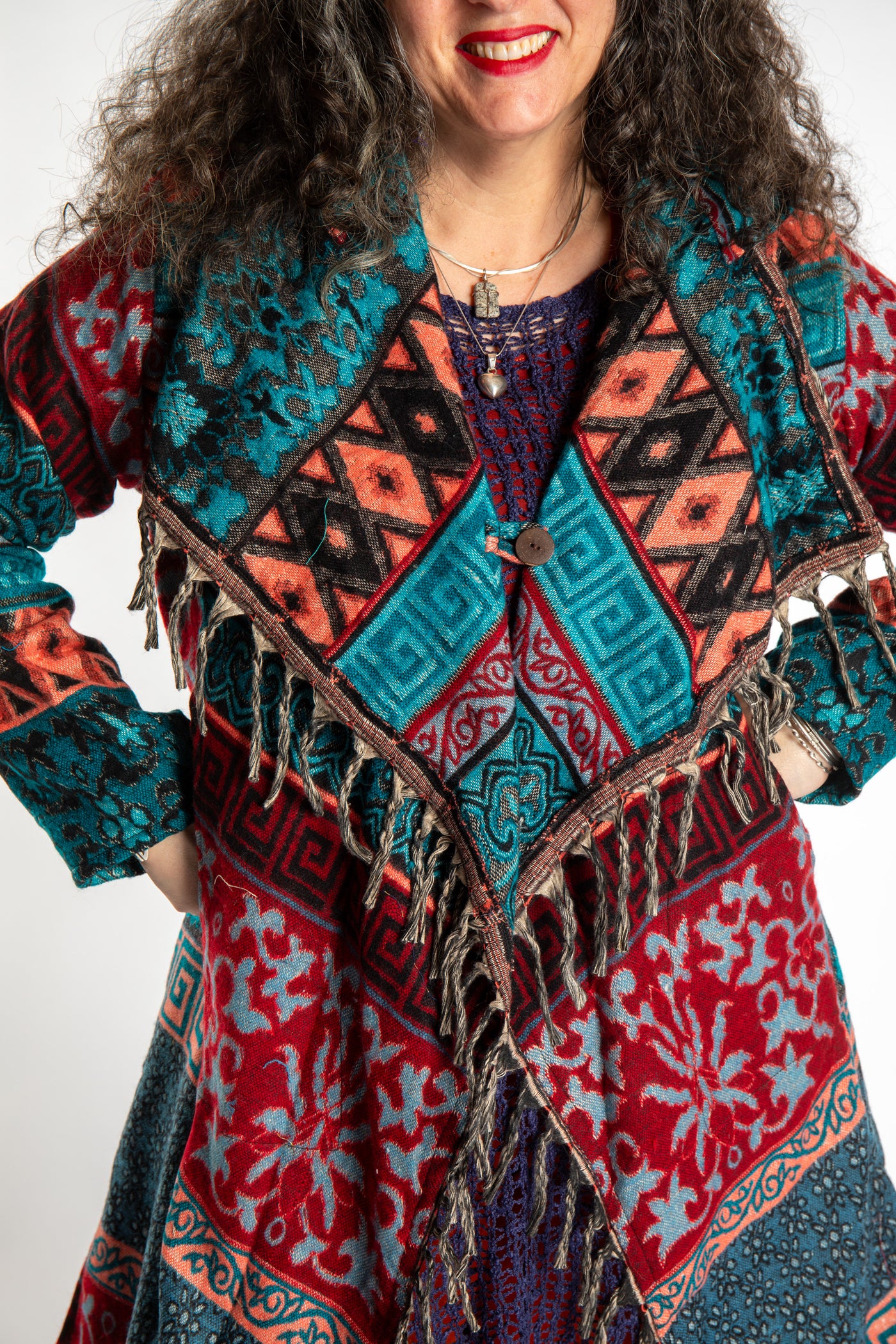 Susan wearing the Teal multicolored patterned blanket jacket 