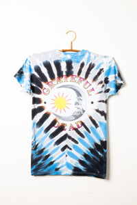 Grateful Dead tie-dye t-shirt with crescent moon design on a hanger against a white background
