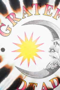 Grateful Dead tie-dye t-shirt with crescent moon design on a hanger against a white background