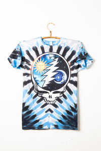 Grateful Dead Steal Your Face skull with lightning bolt, sun, and galaxy design on a tie-dye background