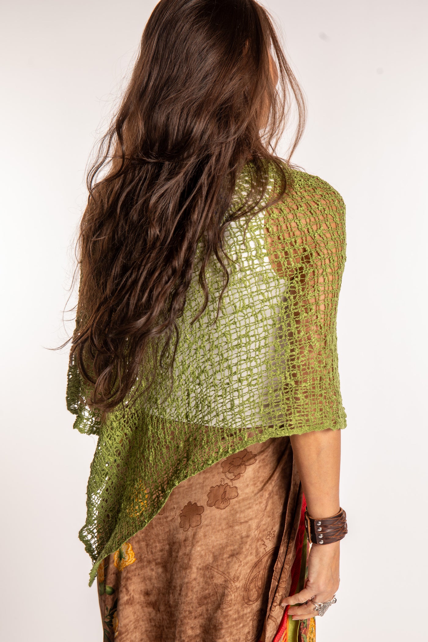Jen is wearing the Avocado loose weave shawl
