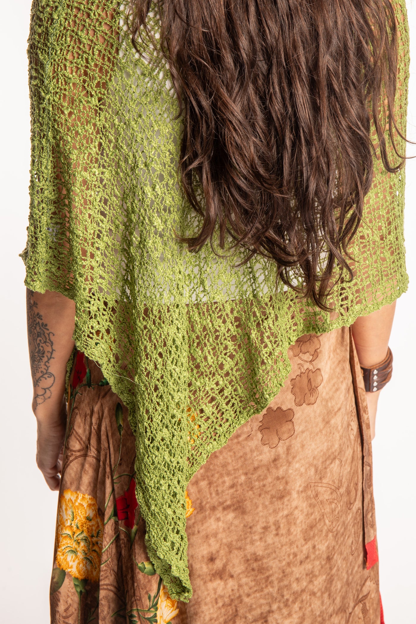 Jen is wearing the Avocado loose weave shawl