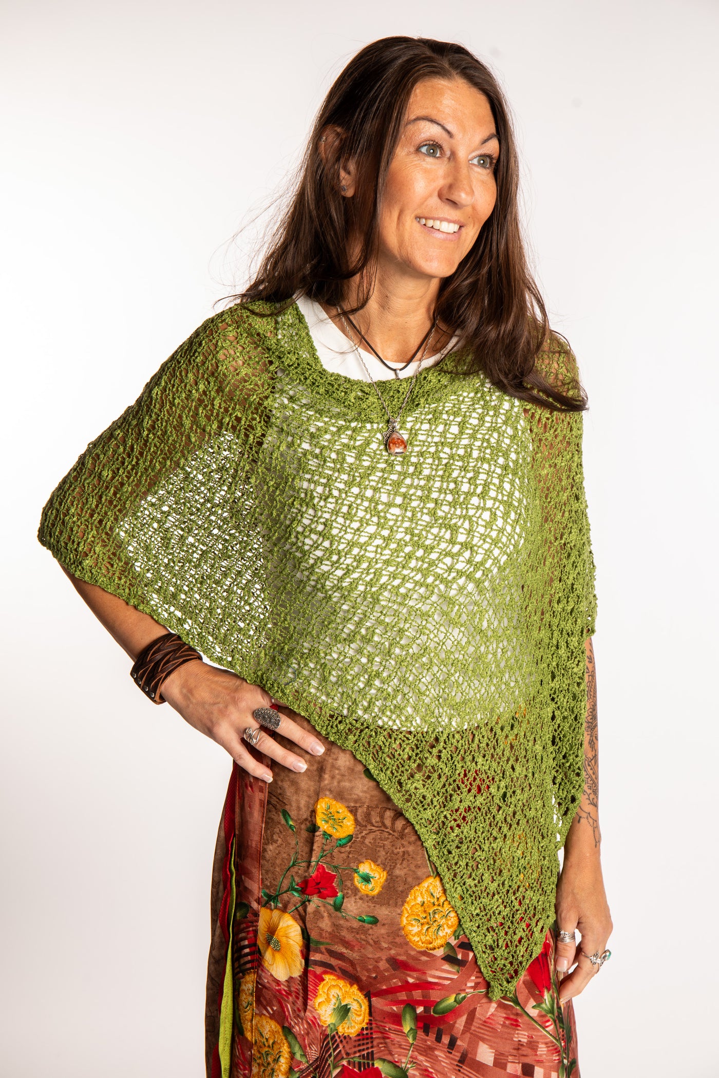 Jen is wearing the Avocado loose weave shawl