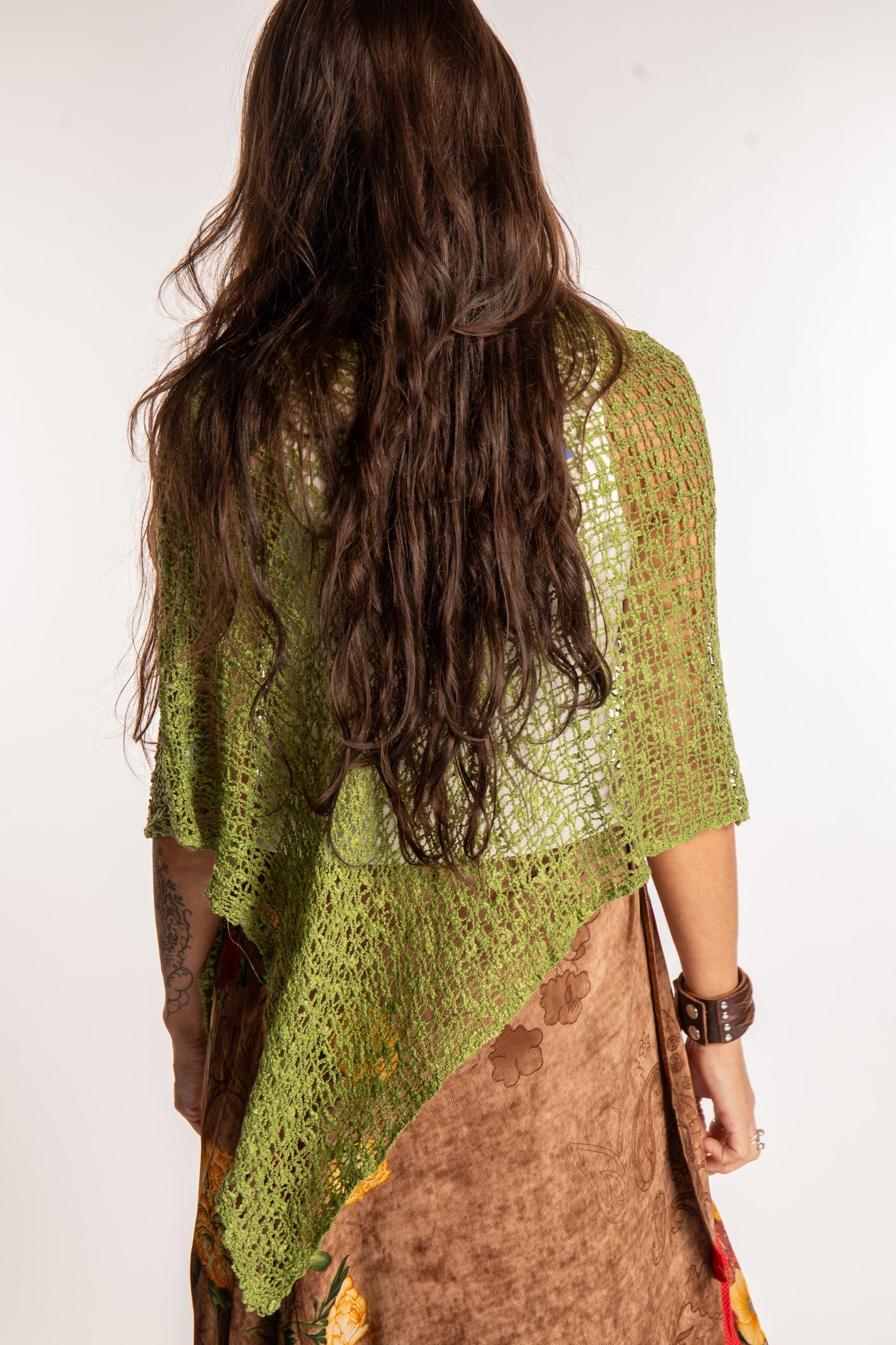 Jen is wearing the Avocado loose weave shawl