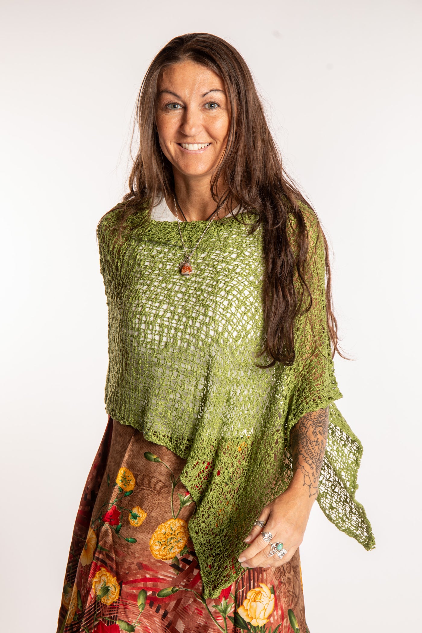 Jen is wearing the Avocado loose weave shawl