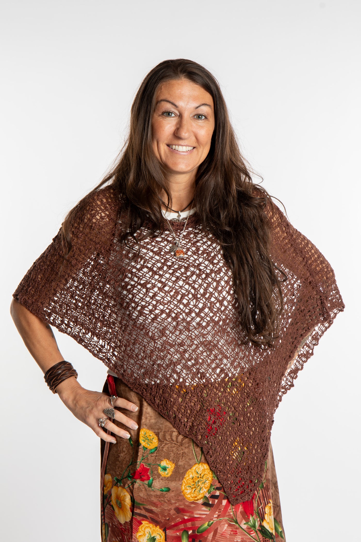 Jen is wearing the Brown loose weave shawl