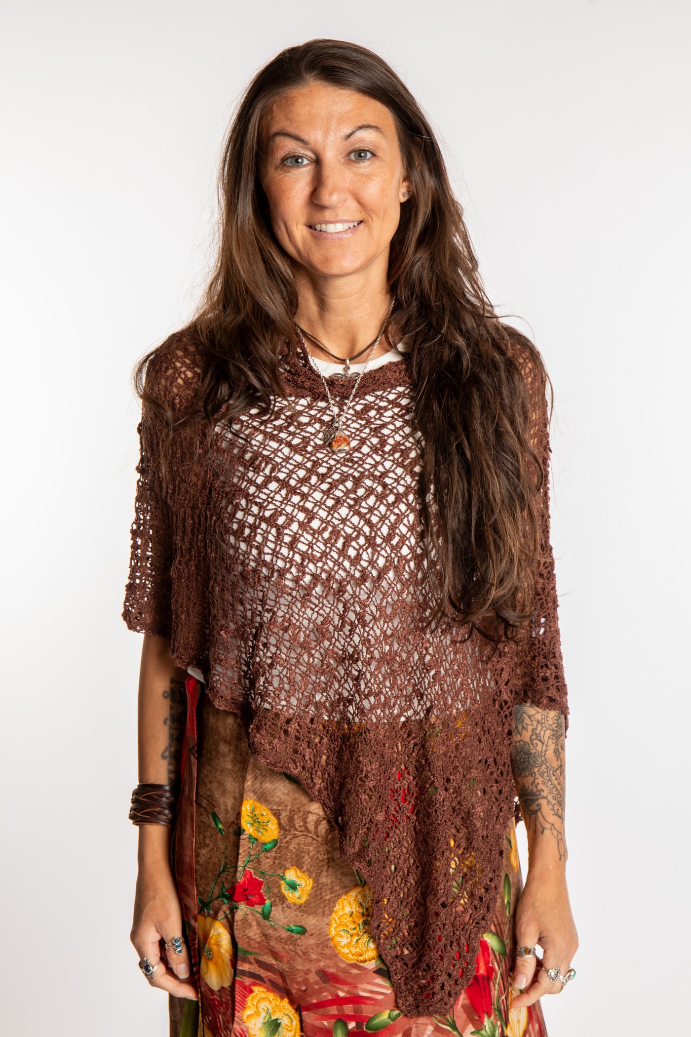 Jen is wearing the Brown loose weave shawl